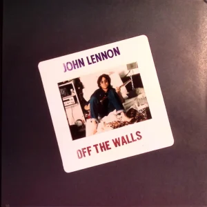 A sticker of john lennon with the words " off the walls ".