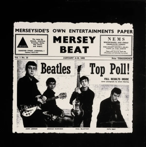 A newspaper with the beatles on it.