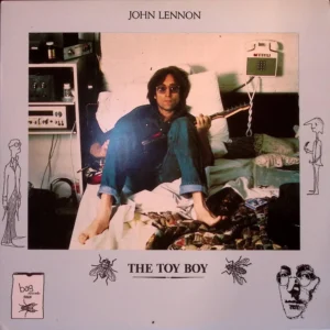 A picture of john lennon in his bedroom.
