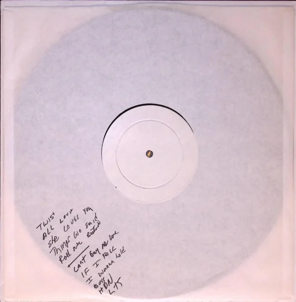 A white record with some writing on it