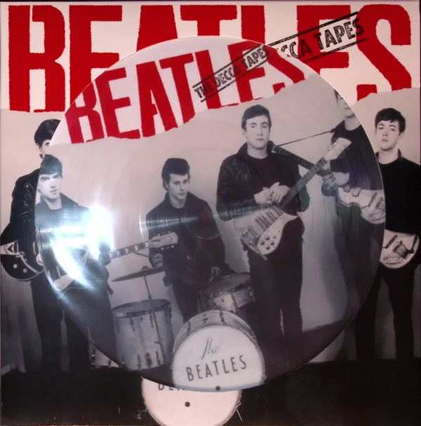 A picture of the beatles on a disc.