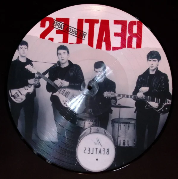 A picture of the beatles on a record.