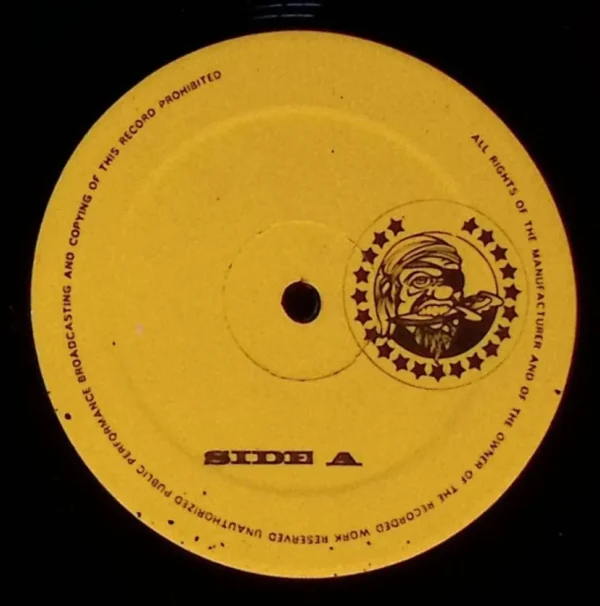 A yellow disc with the word " side " on it.