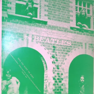 A green and white photograph of the beatles