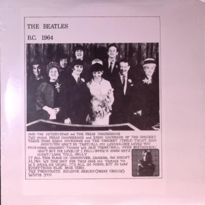 A black and white photo of the beatles