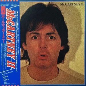 A picture of paul mccartney on the cover of his album.