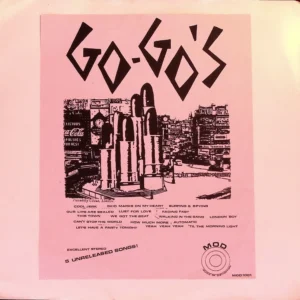 A pink poster with black lettering and an image of lipstick.