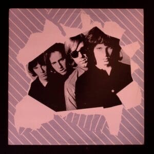 The Doors band photo, torn album art.