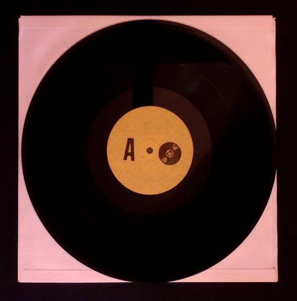Black vinyl record, side A label.