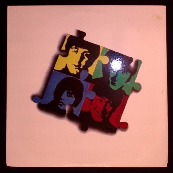 Beatles puzzle album cover art.