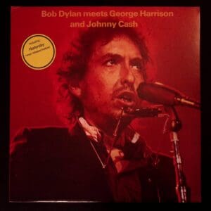 Bob Dylan, George Harrison, Johnny Cash album cover.