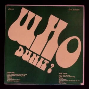 Who Dunit? Live concert album cover.