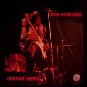 Jimi Hendrix playing guitar on stage.