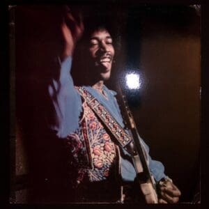 Jimi Hendrix performing on stage.