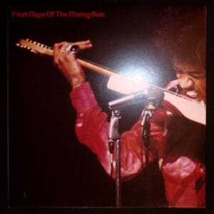 Here's an alt tag for the image: First Rays of the Rising Sun album cover.