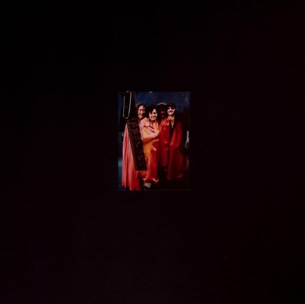 Photo of four people in robes.