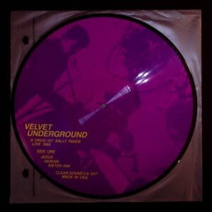 A purple circular picture with the words velvet underground on it.