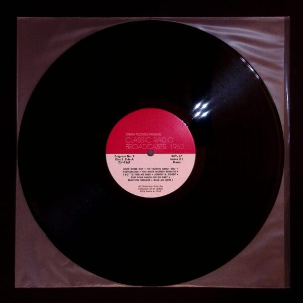 A black record with red and white label.