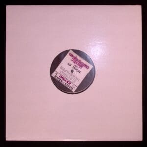 A white record with some stickers on it