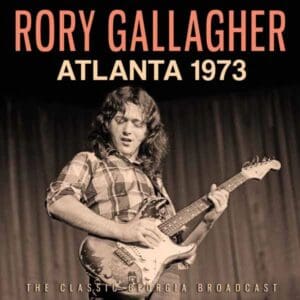 Guitarist performing live on stage, Atlanta 1973.