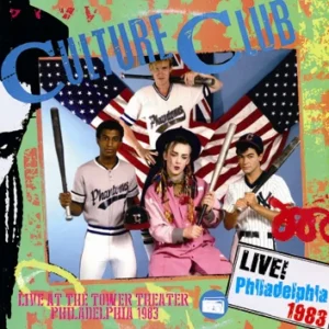 Culture Club band with baseball bats, flags.