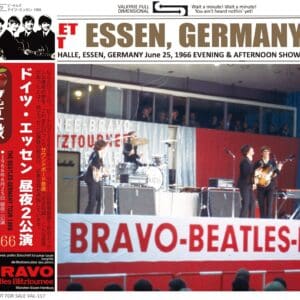Band performing on stage with instruments.