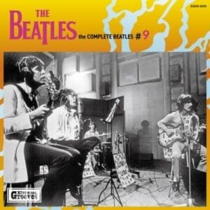 The Beatles recording in a studio session.