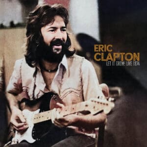 Musician playing guitar, Eric Clapton album cover.