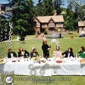 People at a long outdoor dining table.