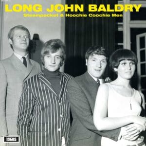 Black and white photo of Long John Baldry and band members in 1960s attire.