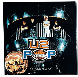 U2 POP album cover featuring the band with a disco ball and futuristic elements.