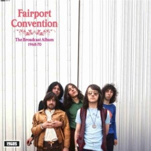 Fairport Convention album cover featuring band members against a corrugated metal background.