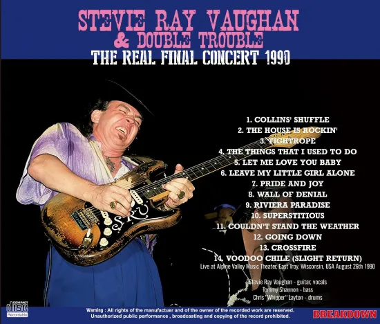 Stevie Ray Vaughan passionately playing guitar during a 1990 live concert.